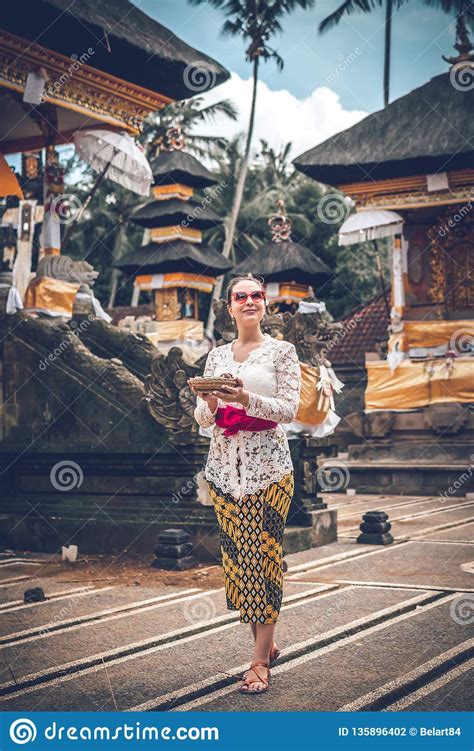 BALI INDONESIA DECEMBER 26 2018 European Woman In Traditional