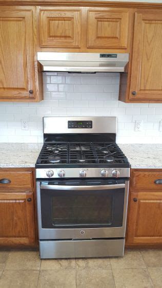 In a kitchen with an open layout, it can be challenging to link the workspace to adjacent living areas. Kitchen Remodel | Farmhouse kitchen backsplash, Kitchen ...