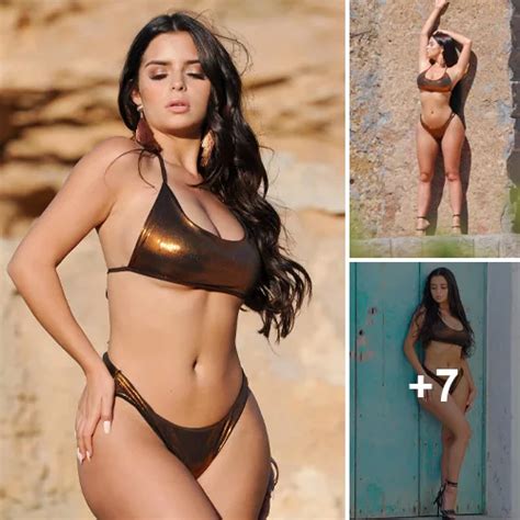Demi Rose Flaunts Swimsuit Body As She Strikes A Pose With A Playful