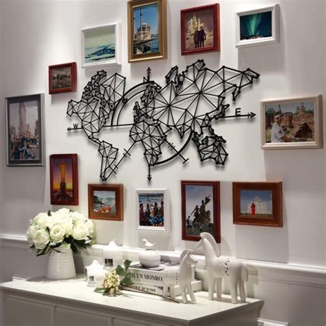 White chair and metal table against the wall of white boards. Hencely Metal World Map , Metal Wall Decor , Metal Wall ...