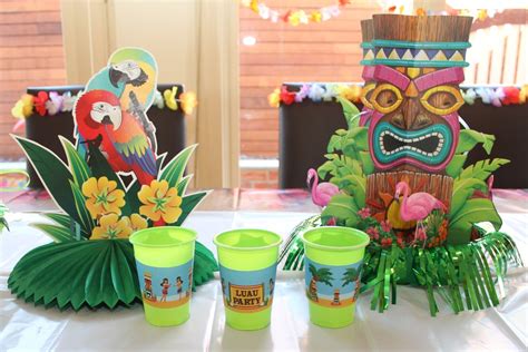 Tables aren't just great places to keep the party food, desserts, and gifts; Hawaiian Luau Party with Desert Table and Games — Chic ...