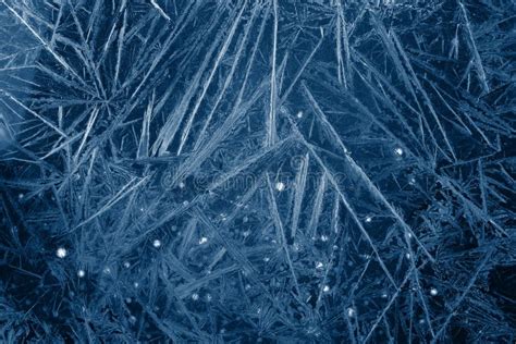 White Freeze Ice Crystal Texture On Black Background Stock Photo