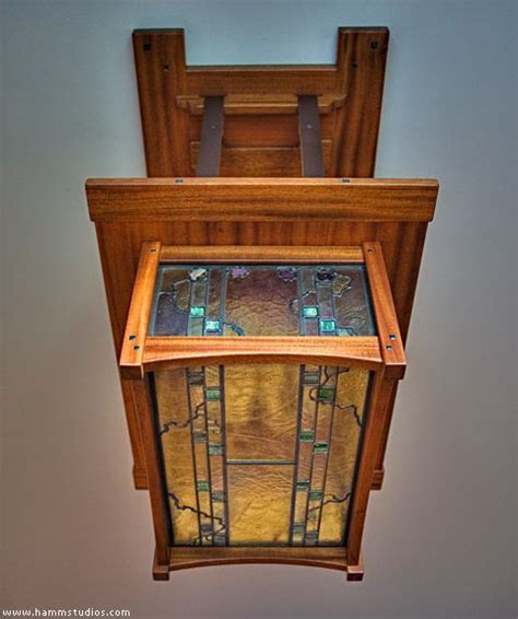 Chandeliers and chandeliers on a arts and crafts dining room lighting in a formal setting usually hang at a height that improves the decoration of the room. Greene and Greene style dining room chandelier with ...