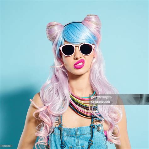 Disappointed Pink Hair Girl In Funky Manga Outfit High Res Stock Photo