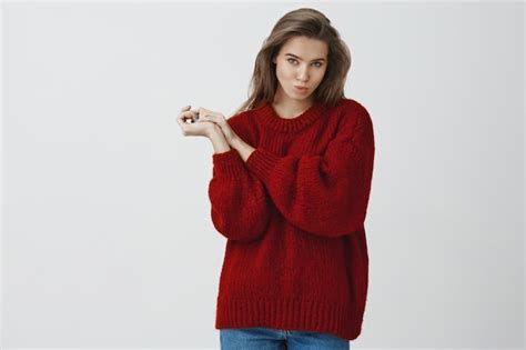 Free Photo Silly And Playful Sexy Woman In Red Loose Warm Sweater