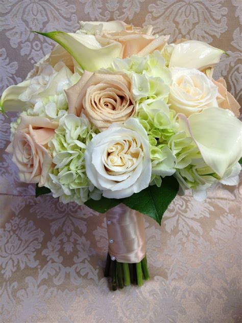 Cream And Blush Roses With White Mini Calla Lilies Mixed With Green