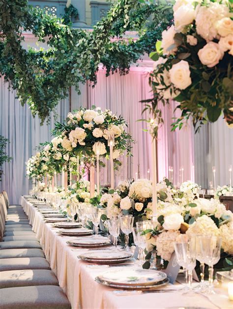White and green wedding reception flowers. Tall Green and White Floral Centerpiece with Roses