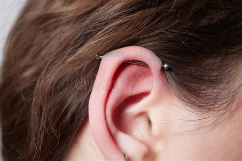 Stretched Lobe Piercing Grunge Concept Pierced Woman Ear With Black