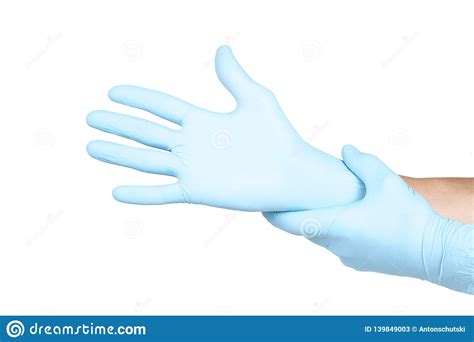 Doctor Putting On Blue Sterilised Medical Glove For Making Operation