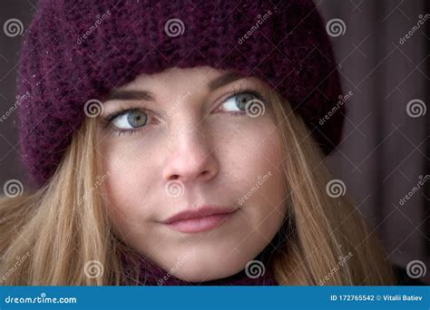 Portrait Of Pretty Caucasian Young Girl In The City Park In Cold Winter