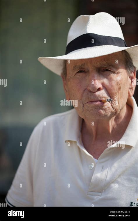 A Old Man Smoking Stock Photo Alamy