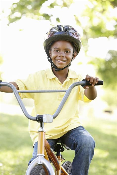 Boy Riding Bike In Park Stock Photo Image Of Riding 55894744