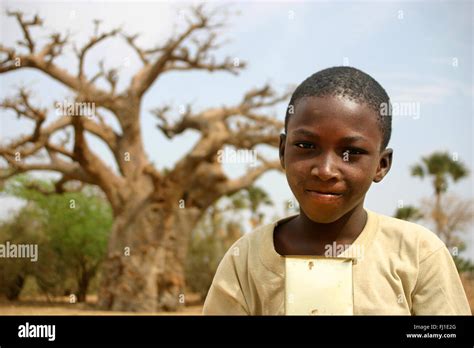 Portrait Of Black Senegalese Child In Sine Saloum Senegal Africa