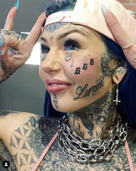 Model Who Spent £20000 On Body Modifications Gets Devilish Tattoo On Her Face Daily Star