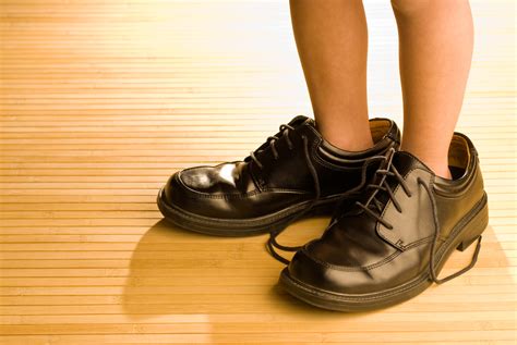 Big Shoes To Fill Childs Feet In Large Black Shoe The Scholarly Kitchen