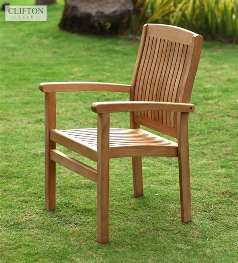 Our collection of teak garden dining chairs features a wide variety of designs with different sizes, styles and functions. Sussex Teak Stacking Armchair | Casa Bella Furniture UK