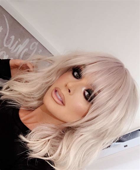 Short Layered Haircut With Bangs Looks Gorgeous On Platinum Hair