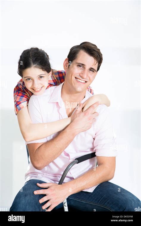 Older Brother And Younger Sister On White Background Stock Photo Alamy