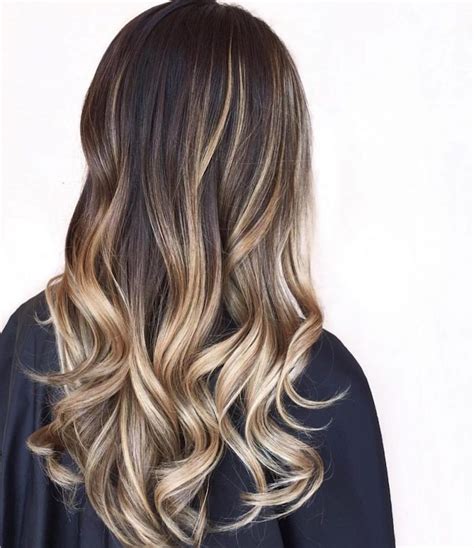 The long dark brown hair looks great with the touch of sandal blonde highlights. 1001 + Ideas for Brown Hair With Blonde Highlights or Balayage