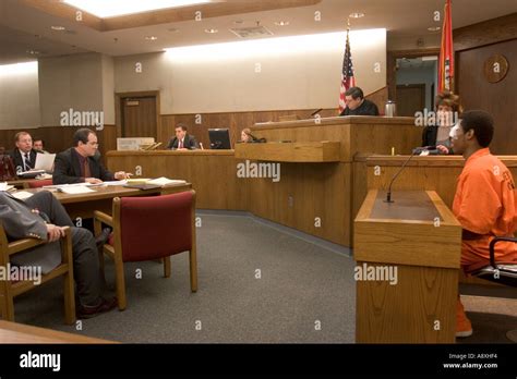 Defendant in witness box to answer questions about a plea bargain