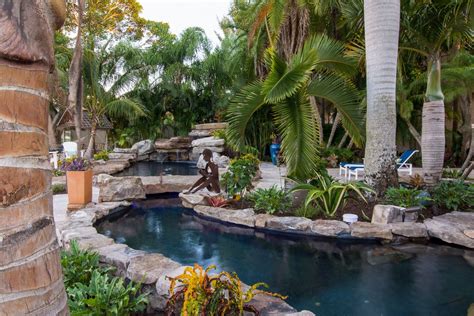 Koi ponds can be designed specifically to promote health and growth of the nishikigoi or japanese ornamental carp. Swimming With The Fishes | Insane pools, Backyard pool ...