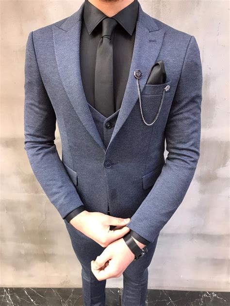 Slim fit suits are the epitome of a contemporary look, perfect for men who embrace fashion and style. GentWith Lansing Blue Slim Fit Wool Suit - Gent With