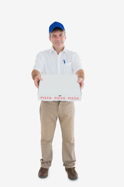 Premium Photo Mature Delivery Man Giving Pizza Box