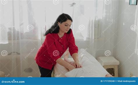 Female Massage Therapist Massaging Client`s Legs Stock Footage Video Of Hands Medical 171729248