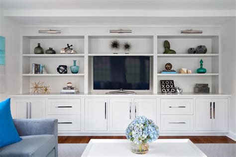 For the most impressive sound system, look into purchasing and installing a 5.1 or 7.1 surround system. Relaxing Living Room With Entertainment Center | HGTV