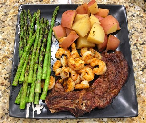 The potatoes and whole garlic cloves are cooked in chicken broth to meanwhile, cut the unpeeled potatoes into 1 inch cubes or chunks. Homemade Grilled ribeye garlic butter shrimp grilled ...