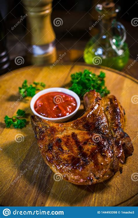 It is a dish of sweetened beef simmered in aromatics and meat spices with a very characteristic dark hue, attributing to generous use of thick/dark soy sauce. Sliced Grilled Beef Barbecue Steak On Cutting Board Stock Photo - Image of black, grilled: 144493398