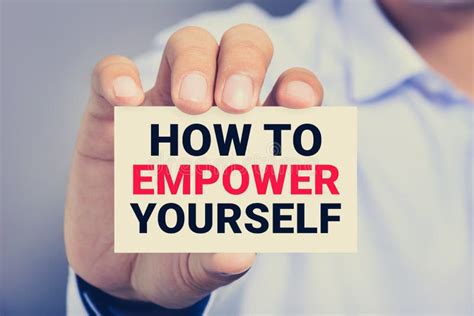 How To Empower Yourself Message On The Card Shown By A Man Stock Photo