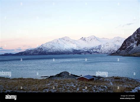Stunning View Of Snowy Mountains In Grotfjord Norway Stock Photo Alamy