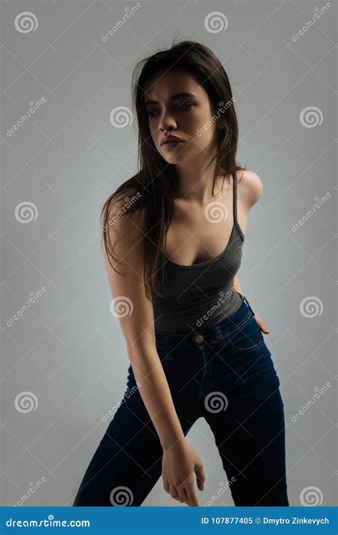 pretty serious woman leaning forward stock image image of humourless longhaired 107877405
