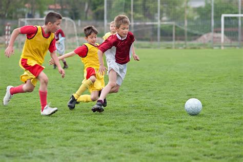 Kids Playing Football Viewing Gallery