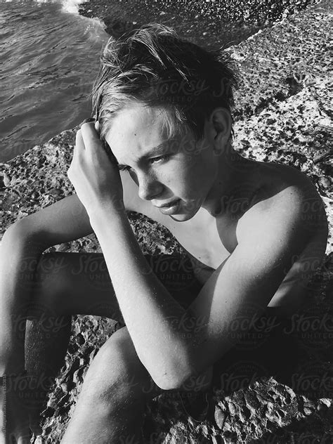 A Nadsome Teenager On A Beach Del Colaborador De Stocksy Anna