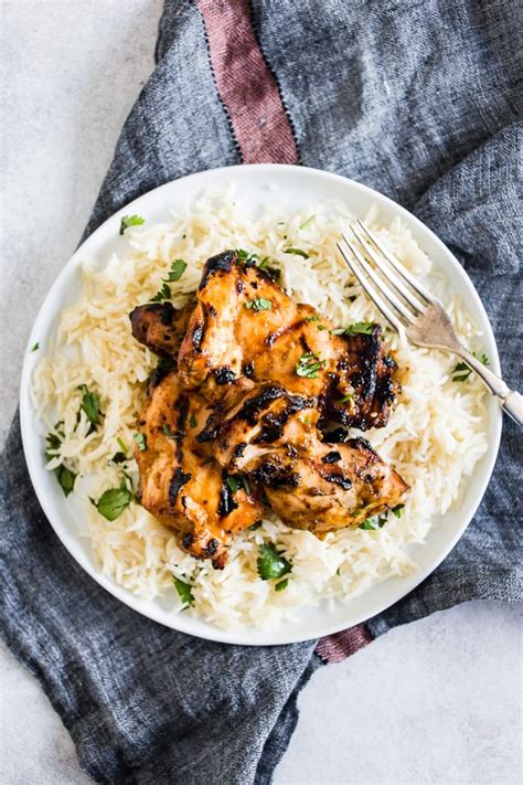 This chicken recipe uses chili powder, cumin, and lime zest…simple spices that pack a punch. Chili Mango Lime Grilled Chicken Thighs | Nutmeg Nanny