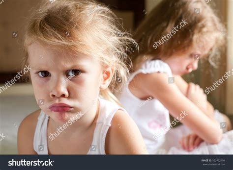 Two Sad Girls On Bed Stock Photo 102472199 Shutterstock