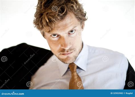 Serious Businessman Putting On Jacket Stock Photo Image Of Beard