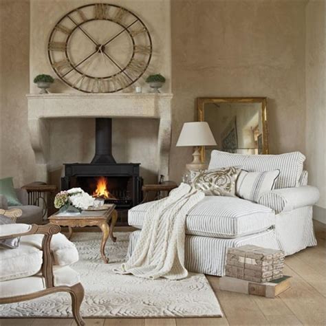 Rustic Country Living Room With Cozy White Chair And Matching Ottoman