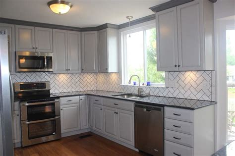This article has given me the validation i need to move forward with the leathered steel gray or a similar dark granite i had originally envisioned for my1880 queen anne home in massachusetts. grey kitchen cabinets - Google Search | Black granite ...