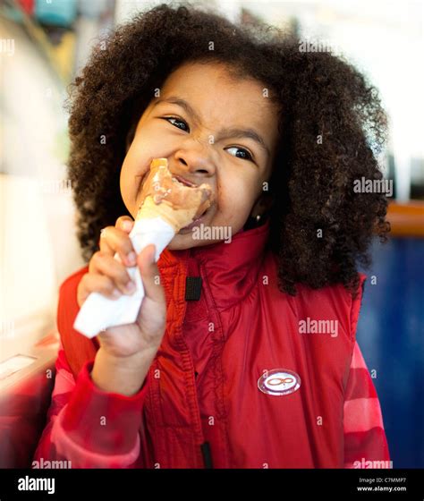 Girl Eating Ice Cream Photo Stock Alamy