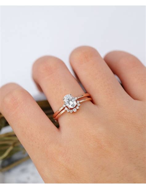 Rose gold wedding rings updated their cover photo. Oval Moissanite Engagement Ring set Rose gold engagement ...