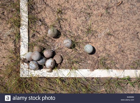 Old Tennis Balls On A Neglected Clay Court Stock Photo Alamy