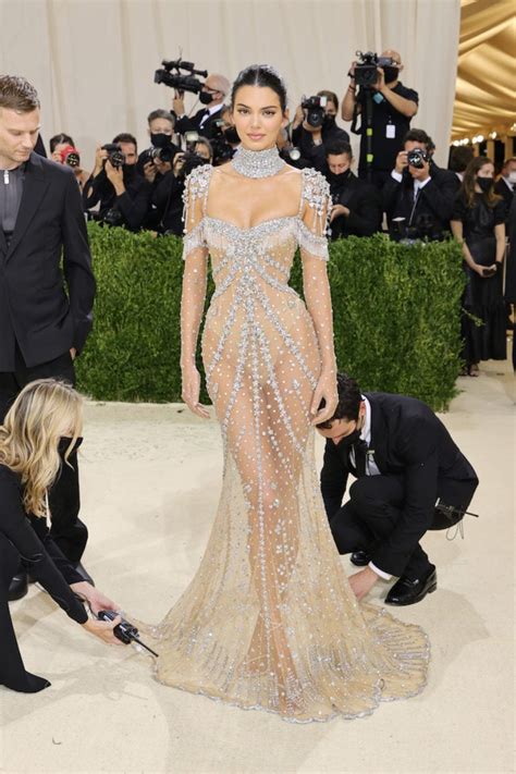 Kendall Jenner Channels My Fair Lady At Met Gala In Nearly Nude Crystal Fringed Gown The