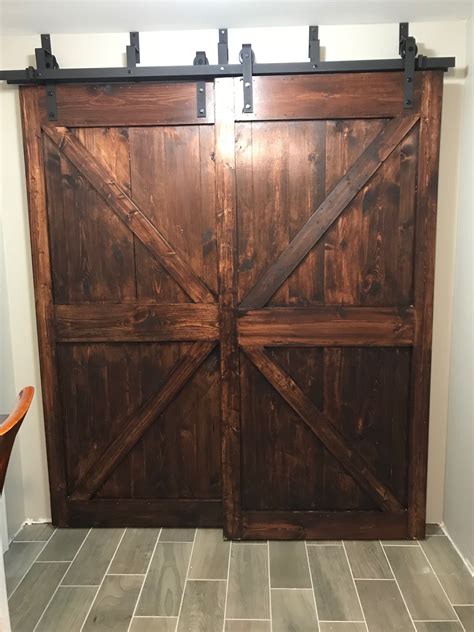 Finally installed bypass barn doors with Hardware from Menards. Made to