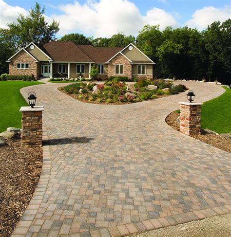 A Circular Cobblestone Driveway Adds A Degree Of Elegance To This Home