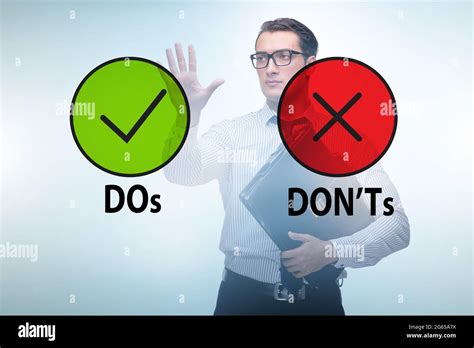 Concept Of Choosing Between The Dos And Donts Stock Photo Alamy