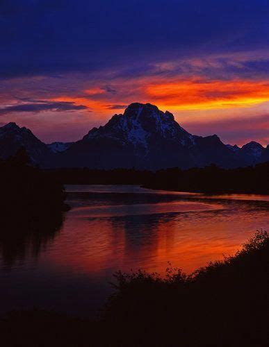 Sunset Over Oxbow Bend Off The Snake River And Mt Moran In Grand