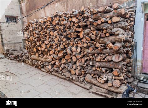 Piles Of Fire Wood Used For Ghat Cremations In Varanasi India Stock
